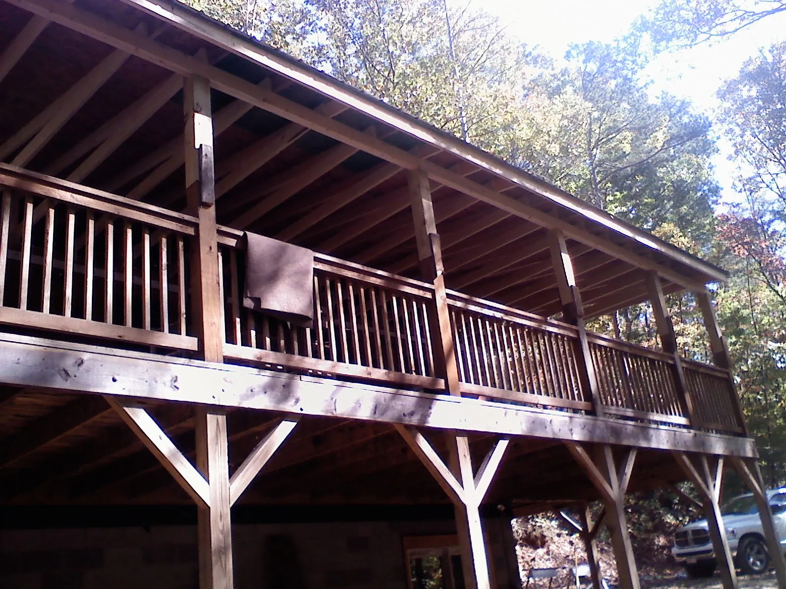 Timber framing under a new elevated porch and deck — Roof Leak Repair in Greenwood by Roofing Brothers